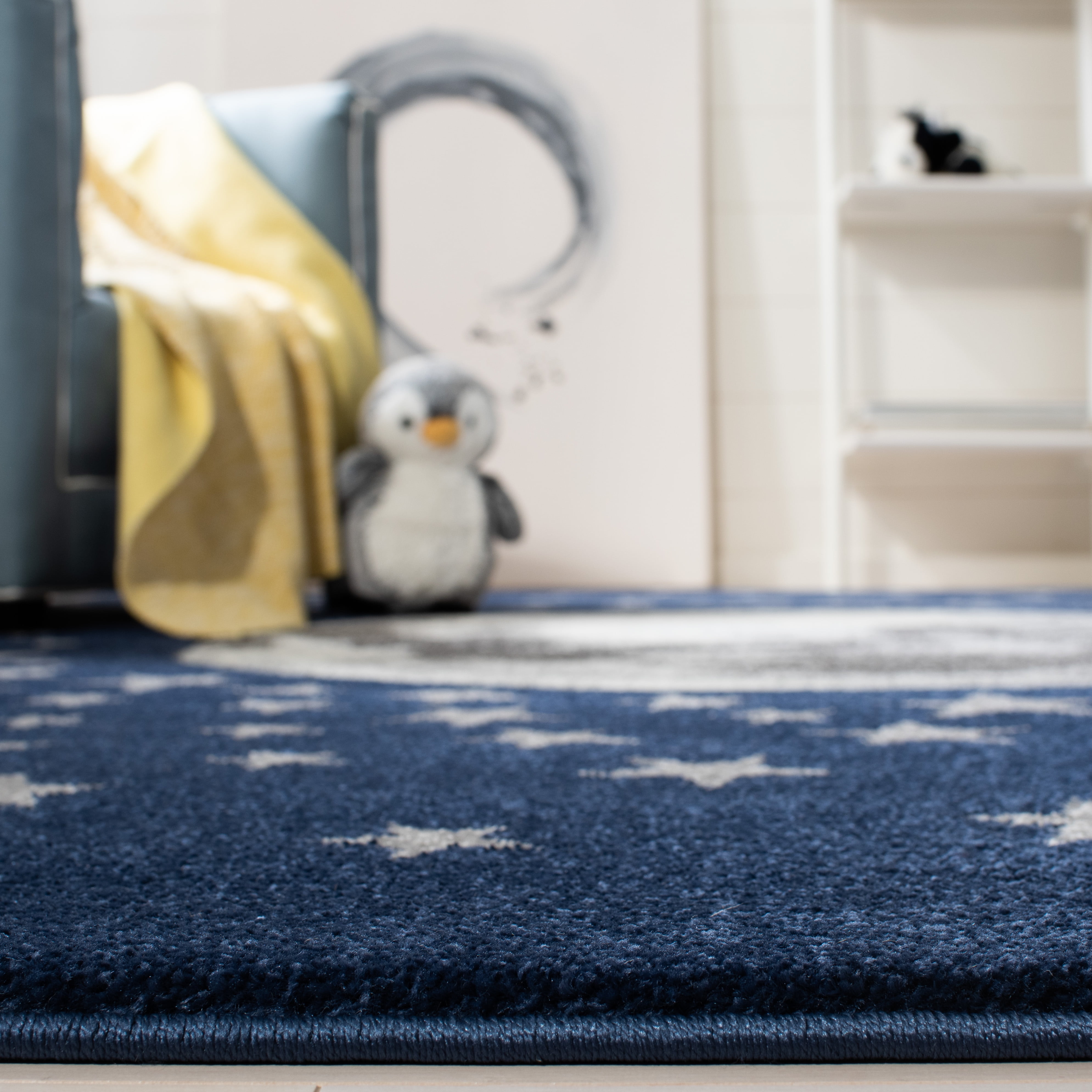 SAFAVIEH Carousel Kids Moon in the Stars Area Rug, Navy/Gray, 3' x 3' Round