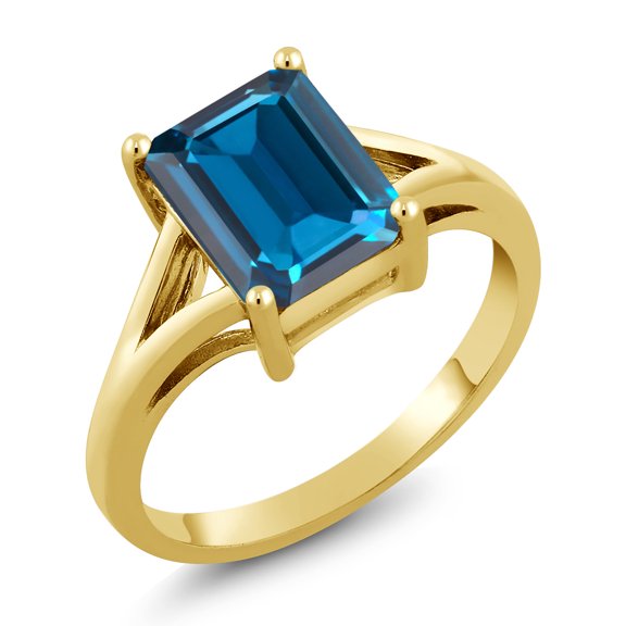 Gem Stone King 18K Yellow Gold Plated Silver London Blue Topaz Solitaire Engagement Ring for Women (2.71 Cttw, Emerald Cut 9X7MM, Gemstone November Birthstone, Size 5)