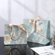 thumbnail image 2 of Bolsa de embalaje de regalo con lazo festivo estilo Ins Mori, bolsa de papel portátil, bolsa de compras de ropa impresa, regalo de acompañamiento, 2 of 3