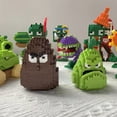 thumbnail image 4 of Bloques de construcción de Plants VS Zombies, minibloques de dibujos animados pequeños, lanzaguisantes, girasol, Chomper, modelo de acción para ensamblar, muñeco de juguete para niños, 4 of 5