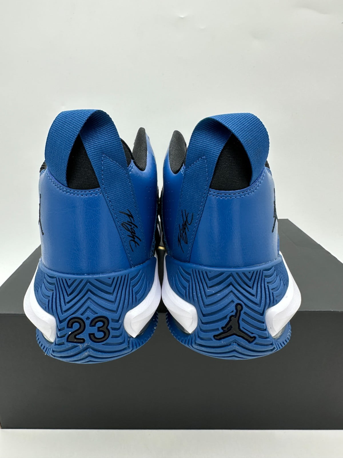 black and blue jordan 23