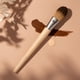 thumbnail image 5 of Brocha facial para base de maquillaje EcoTools Classic para líquidos y cremas, 5 of 9