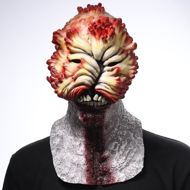 máscara de cosplay de the last of us clickers zombies xuanjing unisex caucho látex, vista frontal centrada de látex con protuberancias rojizas y tonos crema, mandíbula abierta con dientes visibles y ranuras para ojos, faldón texturizado que cubre el cuello imitando piel desgarrada; también suele usarse para sesiones de fotos de terror o decoración en fiestas de disfraces.