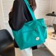 thumbnail image 4 of Bolso de mano personalizado de gran capacidad de Guangzhou, bolso de mano de viaje para estudiantes universitarios de cuero PU de lona suave de alta calidad duplicado superior, 4 of 4