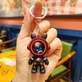 thumbnail image 1 of Llavero con forma de astronauta y conejo con forma de estrella errante, llavero creativo para coche, colgante para pareja, regalo, bolsa para freír, adornos colgantes, 1 of 2