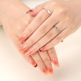 thumbnail image 1 of Presione on Nails FANXINAK, lámina dorada cuadrada, purpurina roja, 1 of 7