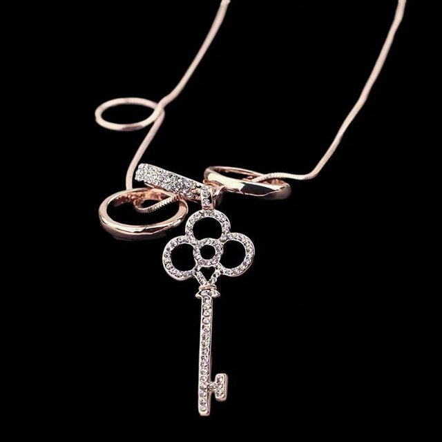 Collar de cadena de suéter de payaso de cristal para mujer, estilo coreano, con cadena de suéter para ropa, colgante de borla larga
