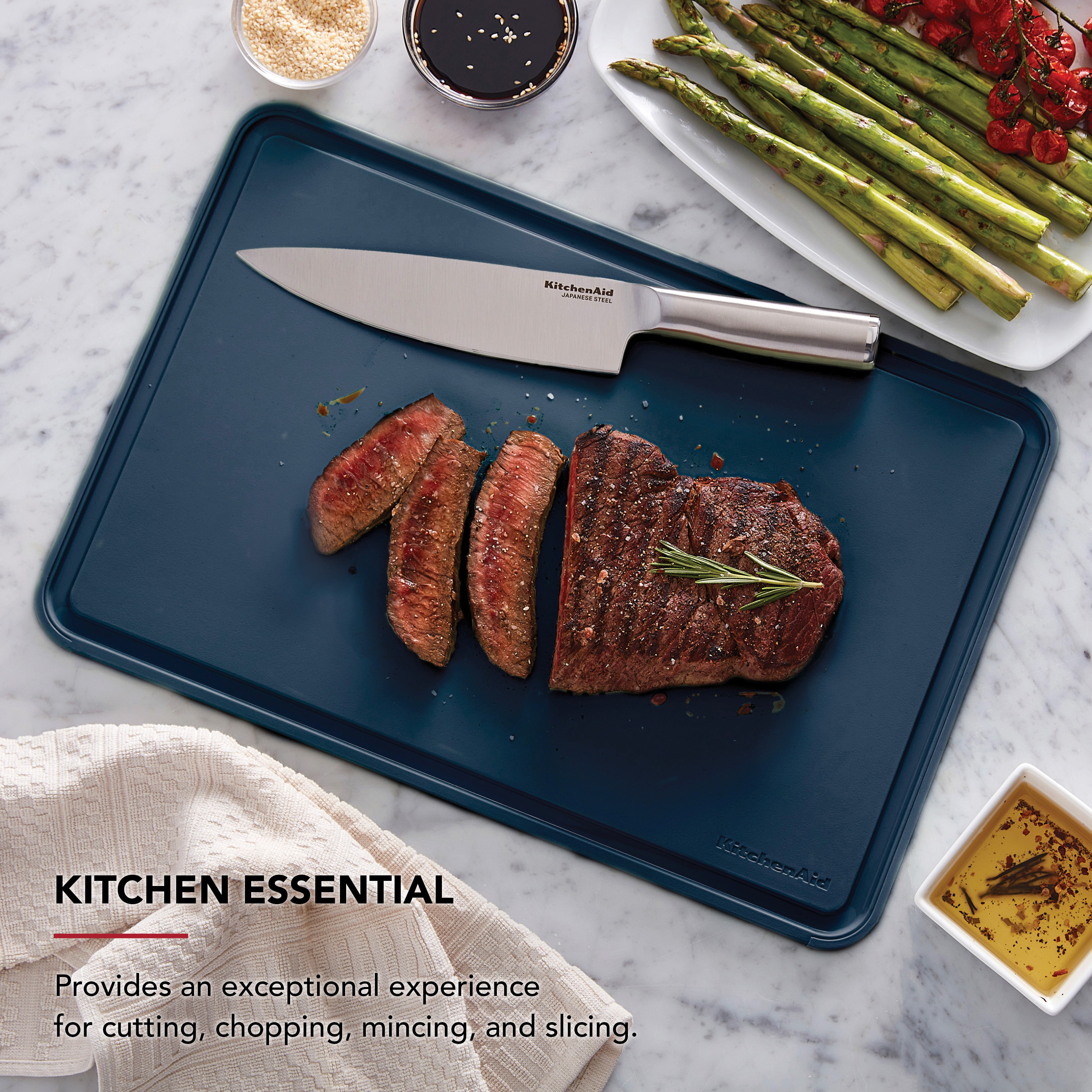 KitchenAid Classic Plastic Cutting Board with Trench, Non-Slip Edges, Dishwasher Safe, 12x18, Ink Blue