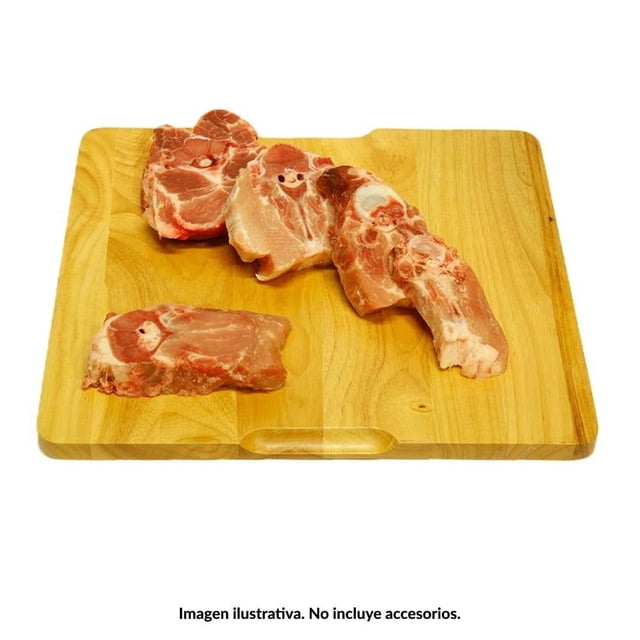 Espinazo de cerdo congelado kilo en cuatro piezas con hueso y carne rosada, sobre tabla de madera clara, ideal para preparar platillos tradicionales y saludables con carne de cerdo.