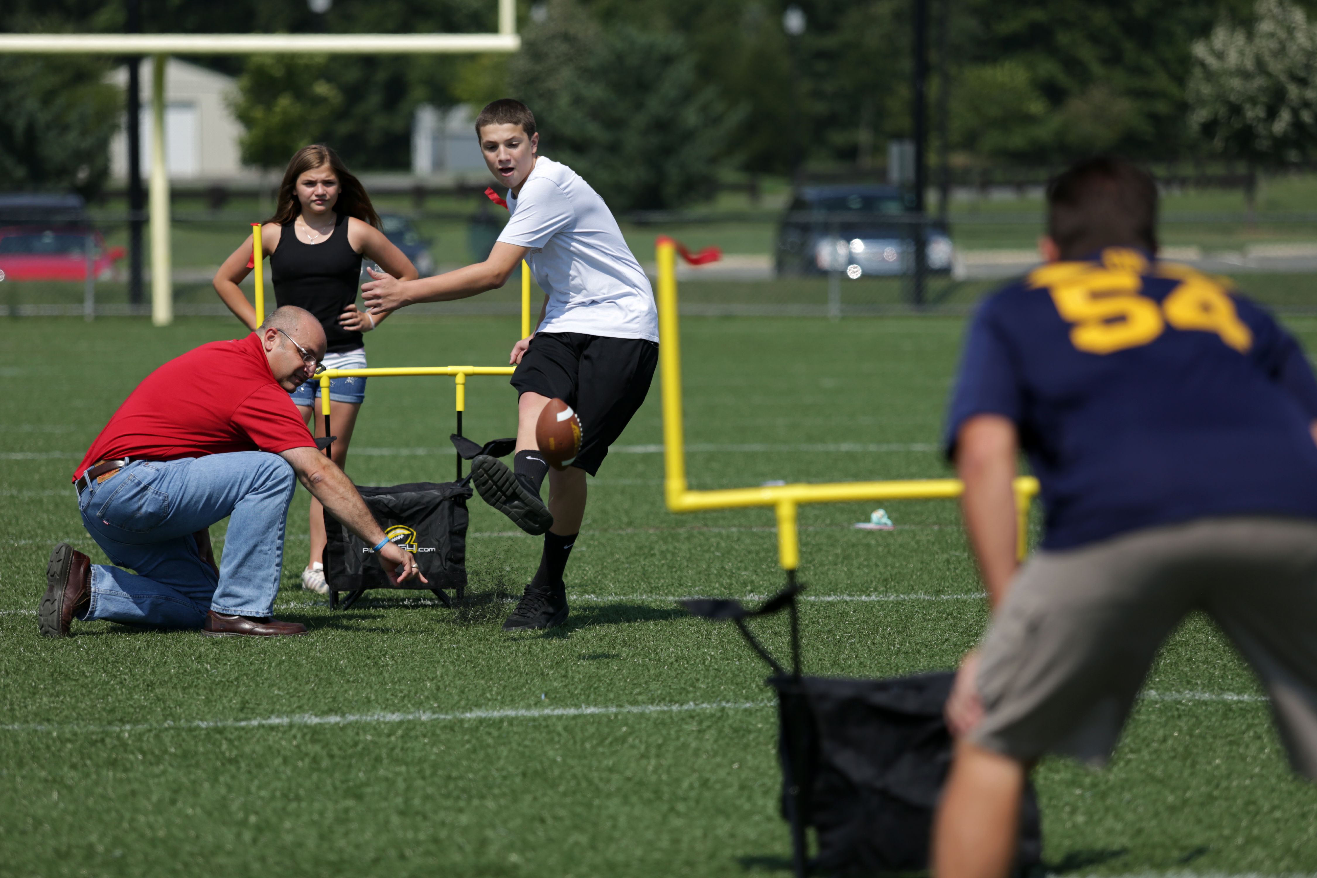 QB54 Ultimate Tailgating, Beach, Backyard, Family Fun Game - Football Toss & Kick Game Built into Two Camping Chairs