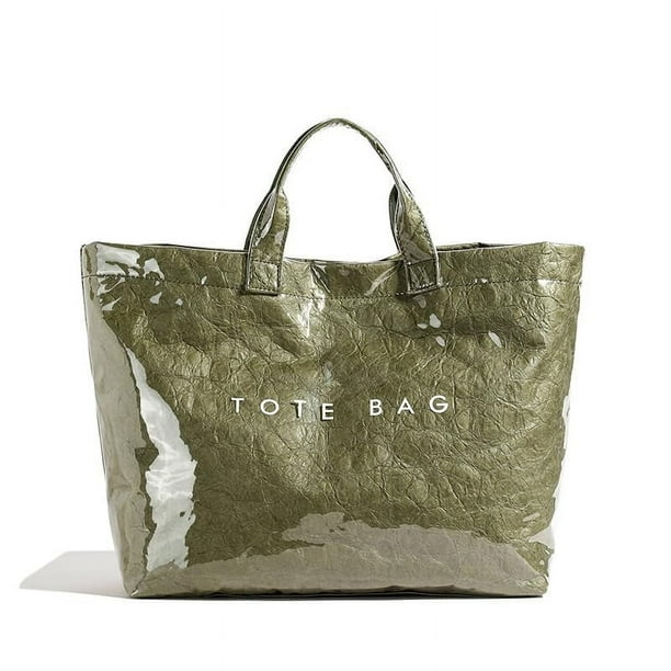 Bolsa de mano Lushandy de PVC para mujer, papel kraft con estampado de letras