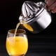 thumbnail image 2 of Exprimidor manual multifuncional de acero inoxidable para zumo de naranja y limón (plateado)., 2 of 7