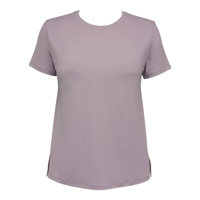playera danskin talla m rosa playera deportivo mujer — Vista frontal centrada de una playera Danskin talla M en rosa claro con cuello redondo, mangas cortas y dobladillo curvado con aberturas laterales; tejido liso y ligero, ideal para entrenamiento ligero y actividad física diaria; también suele usarse como top cómodo para salir.