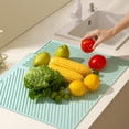 thumbnail image 1 of Fiudx Tapete Multifuncional de Gel de Sílice, Protector de Cocina Resistente Al Calor, Diseño de Drenaje Antideslizante, Fácil de Limpiar, Ideal para Encimeras y Mesas de Comedor, Color Beige y Verde, 1 of 6