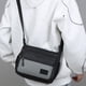 thumbnail image 5 of Bandolera de hombre, bolsa impermeable de nylon para el pecho con correa ajustable y puerto para auriculares para viajes, senderismo y deportes al aire libre, 5 of 6
