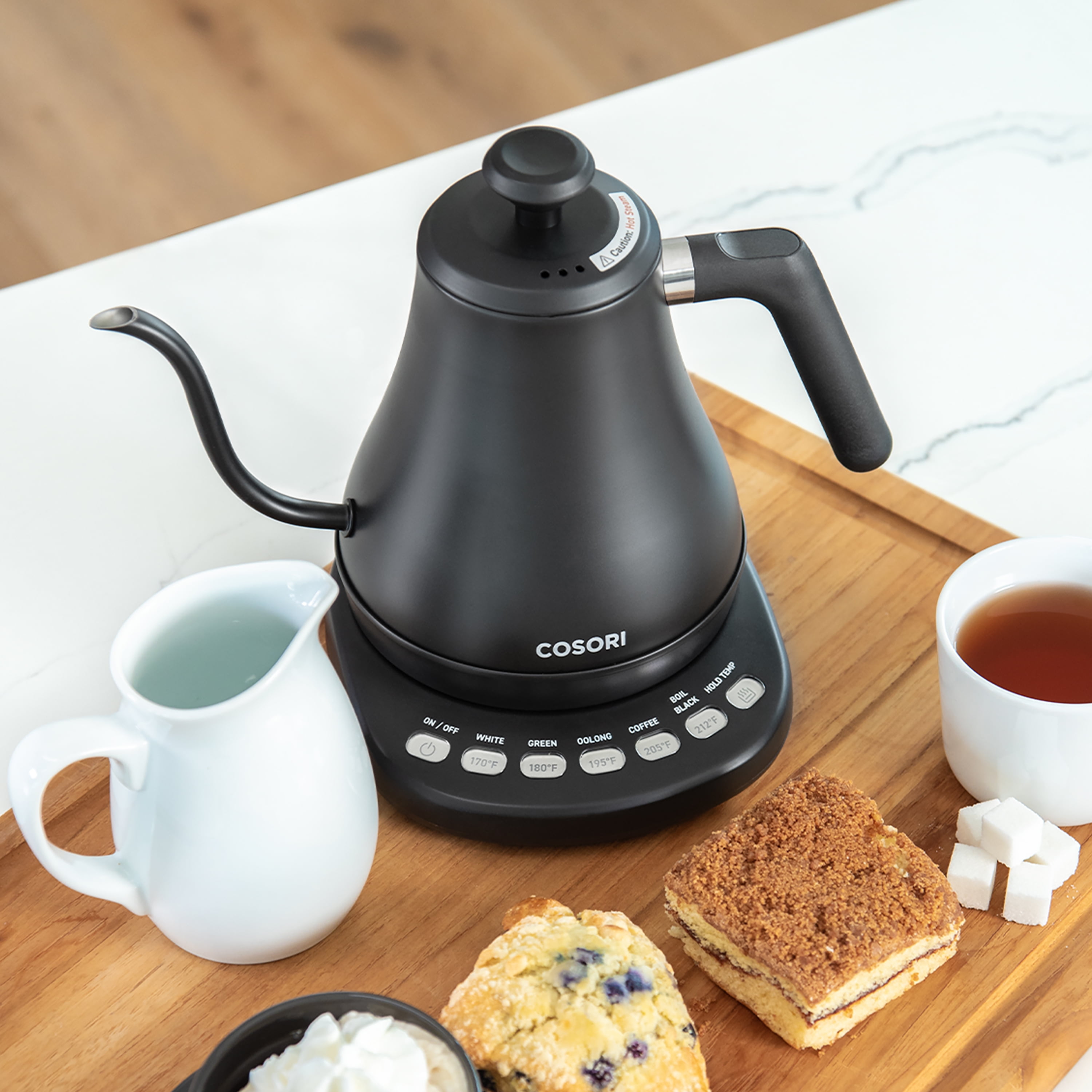 Cosori - Match your kettle to your style and preferences. The CS108-NK  Smart Gooseneck Kettle (left) and the CO117-DK Digital Glass Kettle (right)  are available for purchase on our website at cosori.com! (