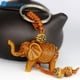 thumbnail image 2 of hecho a mano de resina 3d de dibujos animados de elefante de la suerte tallado colgante llavero/marrón lindo religión cadena llavero joyería huangjie unisex, 2 of 2