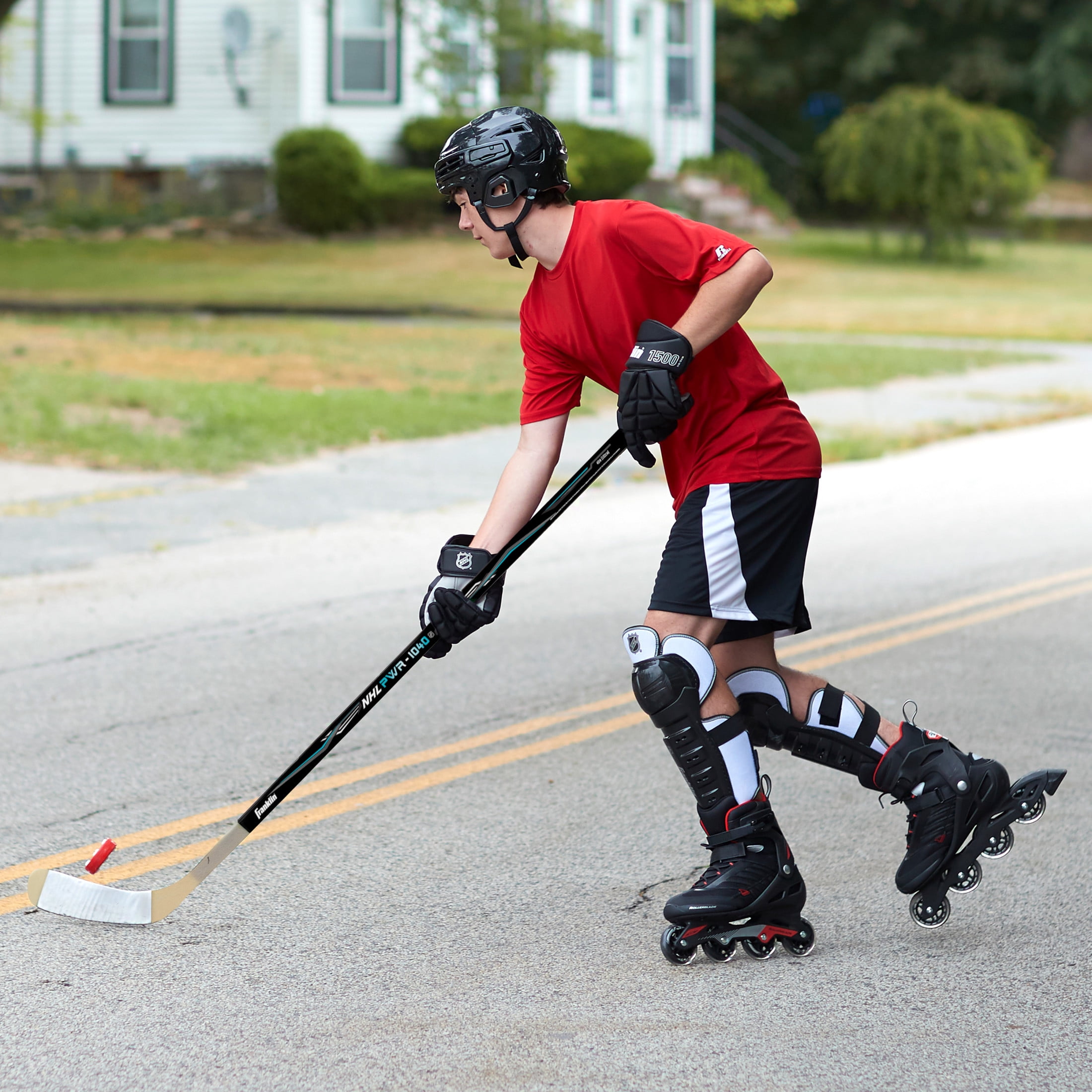 Franklin Sports NHL Youth Street Hockey Stick - Power 1040 Kids Outdoor Street Hockey Sticks - 40" Inch Youth Hockey Stick for Kids - Left Handed Hockey Stick - Wood/Fiberglass Shaft - Lefty