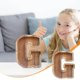 thumbnail image 1 of Lata de ahorros de madera con letras en inglés, lata de ahorros de vidrio transparente, alcancía, 1 of 6