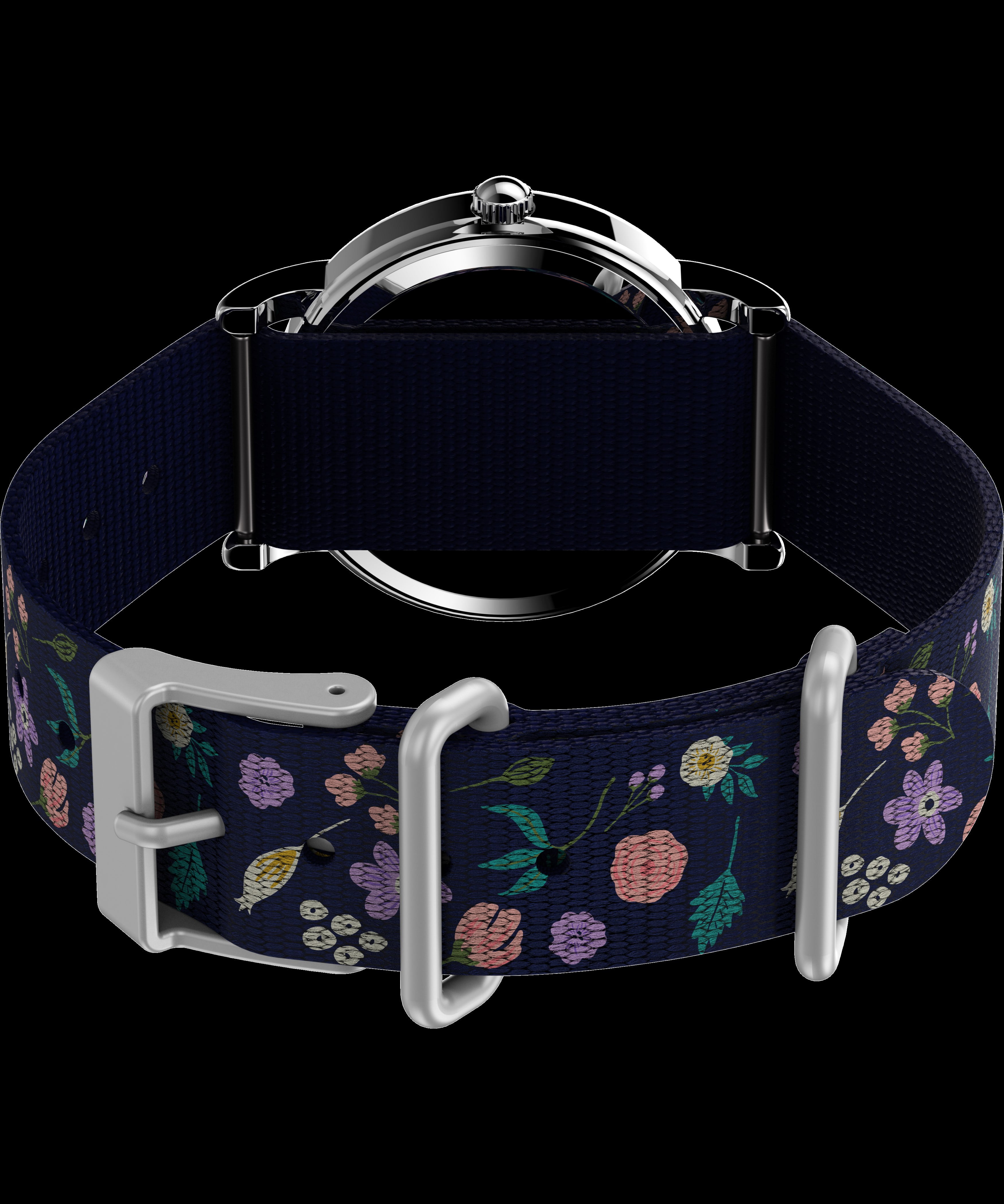 Timex x Peanuts Women's Weekender 31mm Watch – Snoopy Silver-Tone Case White Dial with Blue Floral Fabric Slip-Thru Strap