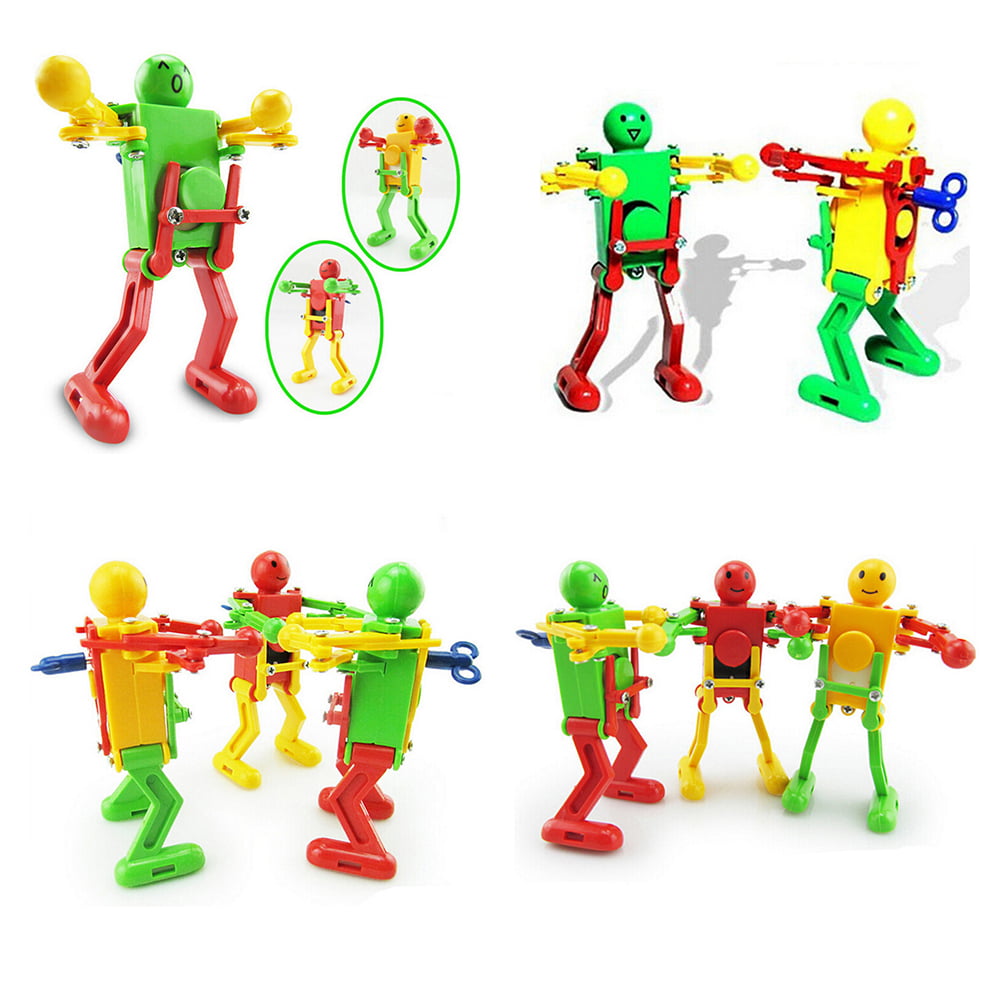 2PCS/lot Clockwork Spring Wind Up Toy Dancing Robots Toy for Children Kids To Lp 