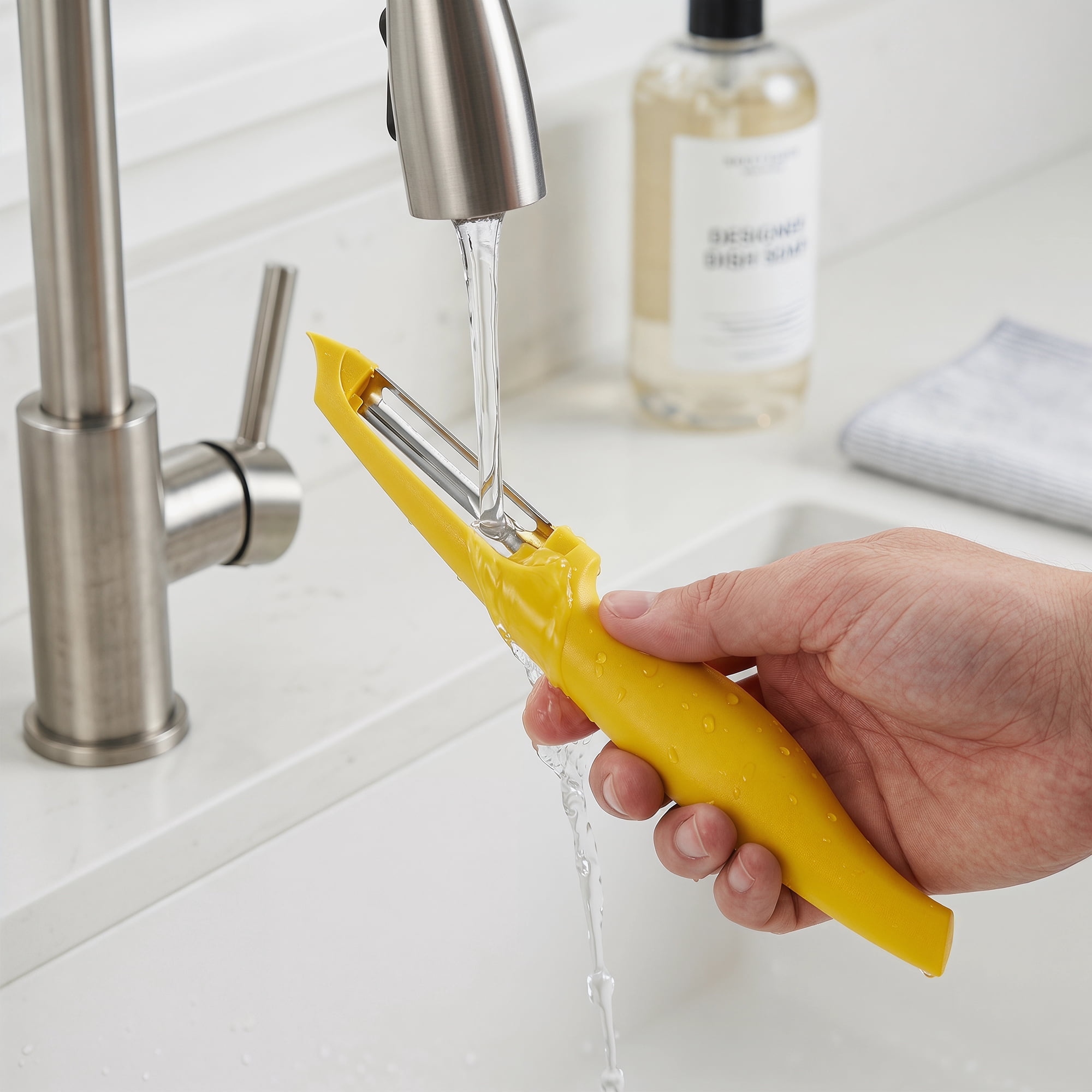 Unique Bargains Plastic Vegetable Peeler with Ergonomic Handle for Peeling Yellow 7.3x1 in