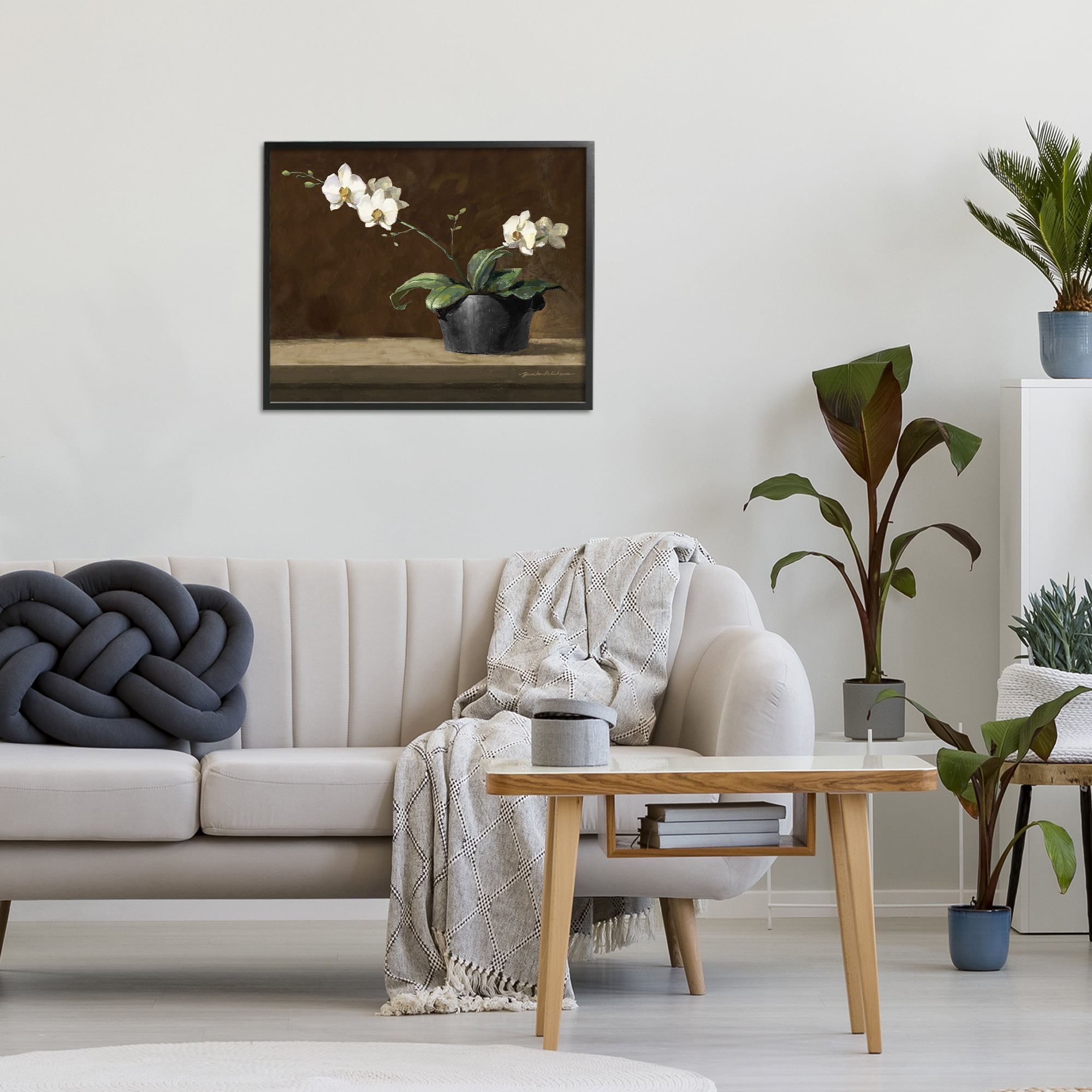 Stupell Industries Potted White Orchid on Ledge Black Framed Giclee Art, design by Yumiko Ichikawa