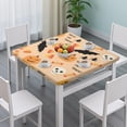 thumbnail image 3 of Stretch-fit Halloween tablecloth with elastic hem, designed for 36x36 inch square tables, features friendly pumpkin and ghost seasonal patterns, 3 of 6