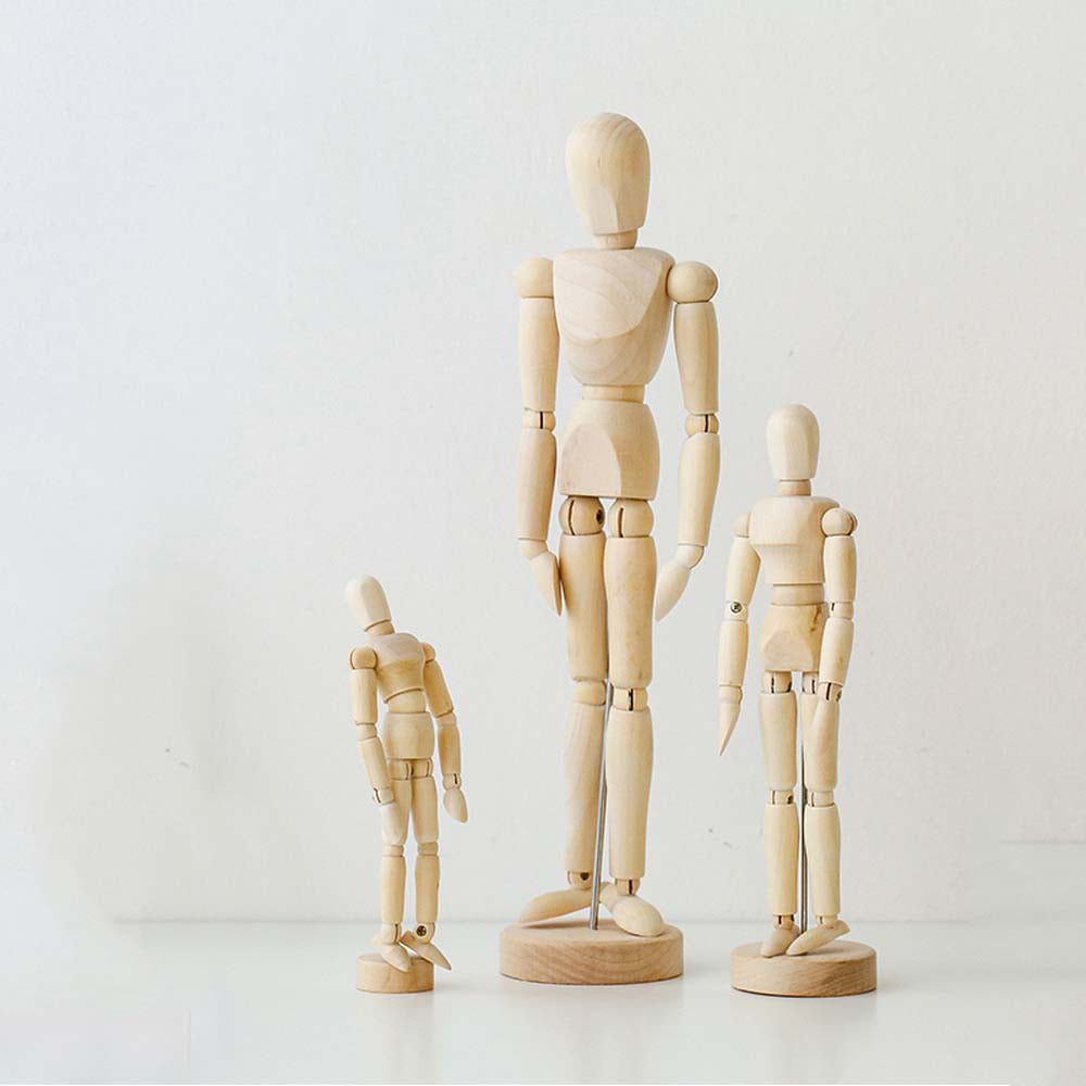 Royalty-Free photo: Wooden mannequin in various poses | PickPik
