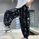 thumbnail image 4 of Odeerbi 5-15 Años Niños Pantalones de Seda Acampanados de Verano Pantalones Jogger Con Estampado Caligráfico Pantalones Farol de Secado Rápido Pantalones Haren, 4 of 4