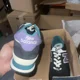 thumbnail image 2 of New Balance Unisex 574 V2 Lace-Up Sneaker, Black/Blue, 13 US Men, 2 of 6