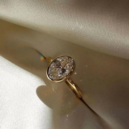 Diiro Minimalist Oval Cut Moissanite Ring for Women, Bezel Set 10K Yellow Gold Vermeil Promise Ring, Oval Cut Engagement Ring