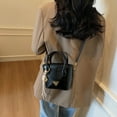 thumbnail image 4 of Versión coreana de bolso de nicho, bolso retro para mujer, nueva tendencia 2025, bolso bandolera versátil de moda, bolso tipo cubo para mujer, 4 of 4