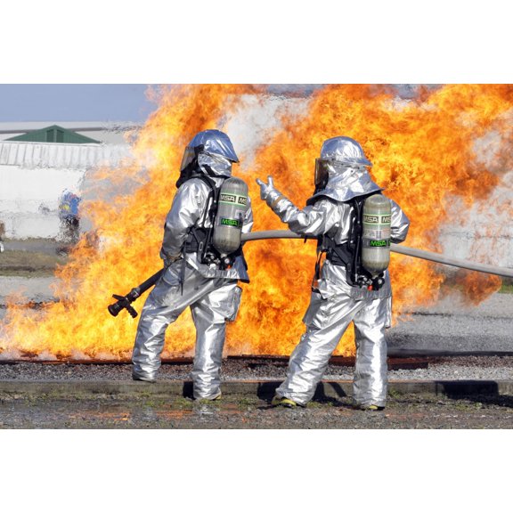 Firefighters battle a simulated fire Canvas Art - Stocktrek Images (34 x 23)