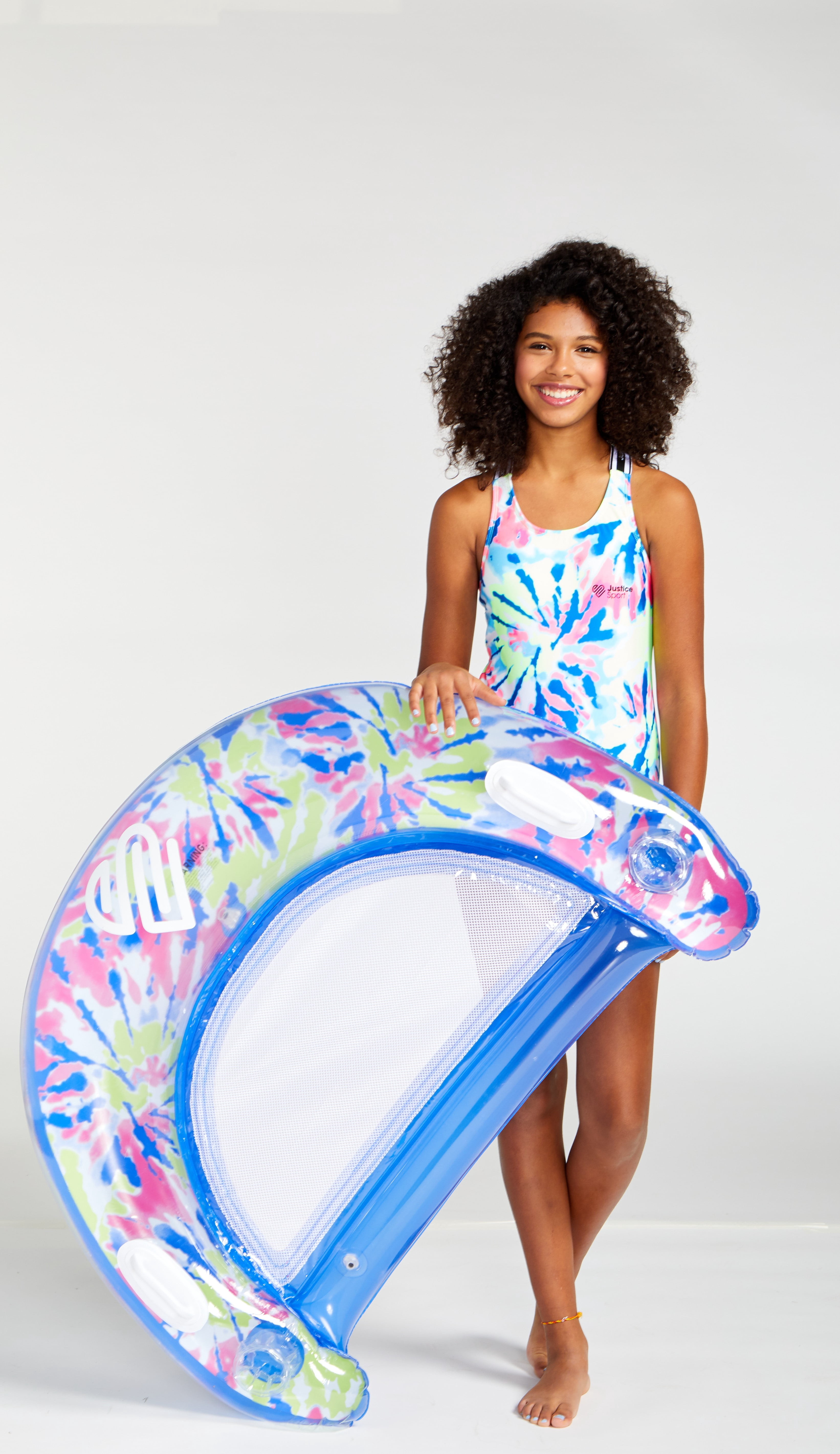Justice Inflatable Chill-Out Pool Chair Float. Take the water in comfort & style with this crescent-shaped Chair - comfortable, supportive design & integrated handles! Multi-color , Ages 6+, Unisex