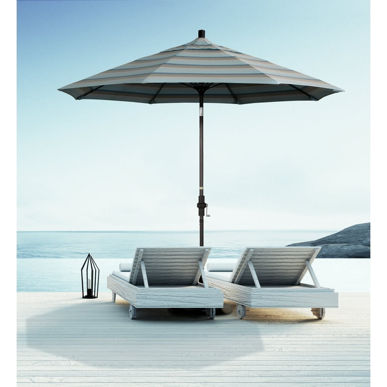 hunter green and white striped patio umbrella Atara Outdoor Auto Tilt Dark Green/White bringing to mind the chic elegance of classic style further emphasized by the sophisticated binding tracing the edge of each panels curving drapery SAFAVIEH Zlatana 9 ft Wooden