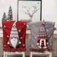 thumbnail image 1 of Paquete de 2 fundas para respaldo de silla con diseño de gnomo navideño para comedor de casa y cocina., 1 of 5