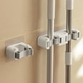 thumbnail image 1 of Mop Holder with Traceless Glue Punch-free Self Adhesive Bathroom Not Easily Break Mop Rod Broom Storage Rack Daily Use, 1 of 8
