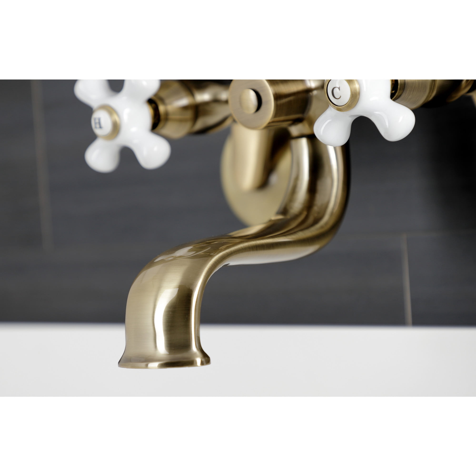 Kingston Brass KS226PXAB Kingston Three-Handle 2-Hole Wall Mount Clawfoot Tub Faucet with Hand Shower in Antique Brass