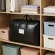 thumbnail image 5 of Bolsa de almacenamiento de alta resistencia con asas reforzadas, organizador grande para ropa y juguetes, tela no tejida impermeable, doble cremallera, 83x49x34 cm., 5 of 6