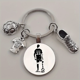 thumbnail image 4 of LLavero De Acero Inoxidable A La Moda, Fútbol, ​​Jersey, Zapato Y Jugador, Llavero Redondo Con Abalorio Para Regalos De Fanáticos Del Fútbol, 4 of 4
