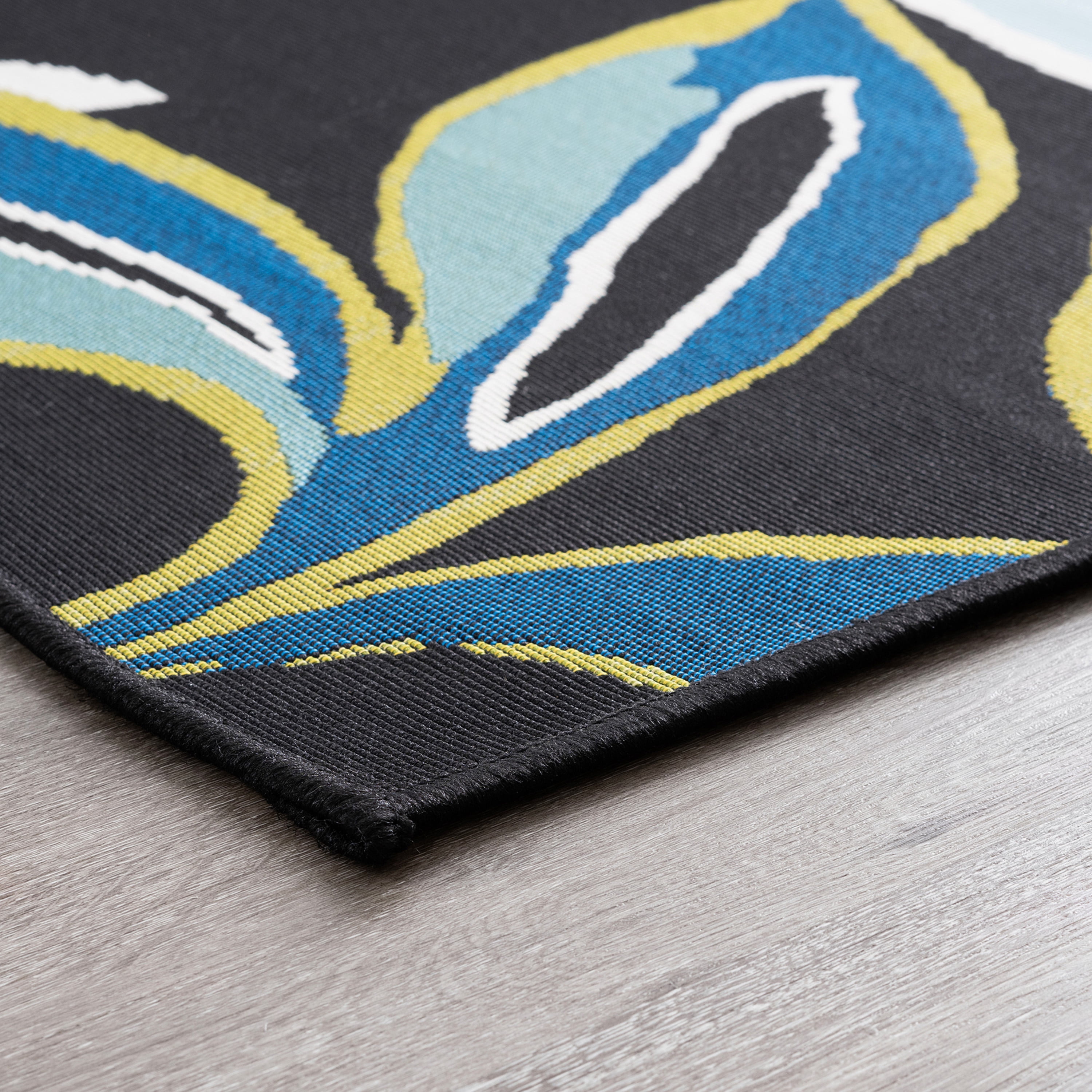 Stunning Transitional 5' x 7' Black and Blue Polypropylene Outdoor Area Rug
