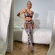 thumbnail image 5 of Conjunto de cuatro piezas de ropa interior sexy con estampado de leopardo y medias altas, 5 of 6