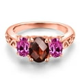 thumbnail image 3 of Gem Stone King 18K Rose Gold Plated Silver Red Garnet and Pink Created Sapphire Filigree Style 3 Stone Ring for Women (2.53 Cttw, Oval 8X6MM and 6X4MM) (Size 5), 3 of 6