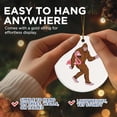 thumbnail image 5 of Sasquatch Carrying A Flamingo Christmas Ornament - Funny Quirky Bigfoot - Neanderthal - 2.8" Round Ornament - Gold String Included - UV Printed Design - Glossy Ceramic - BMCO0818, 5 of 7