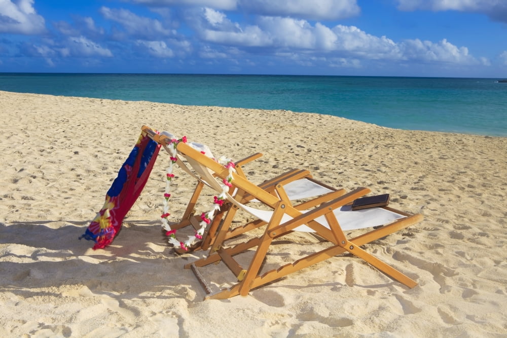 Hawaii Oahu Kailua Two lounge chairs on the white sandy beach of