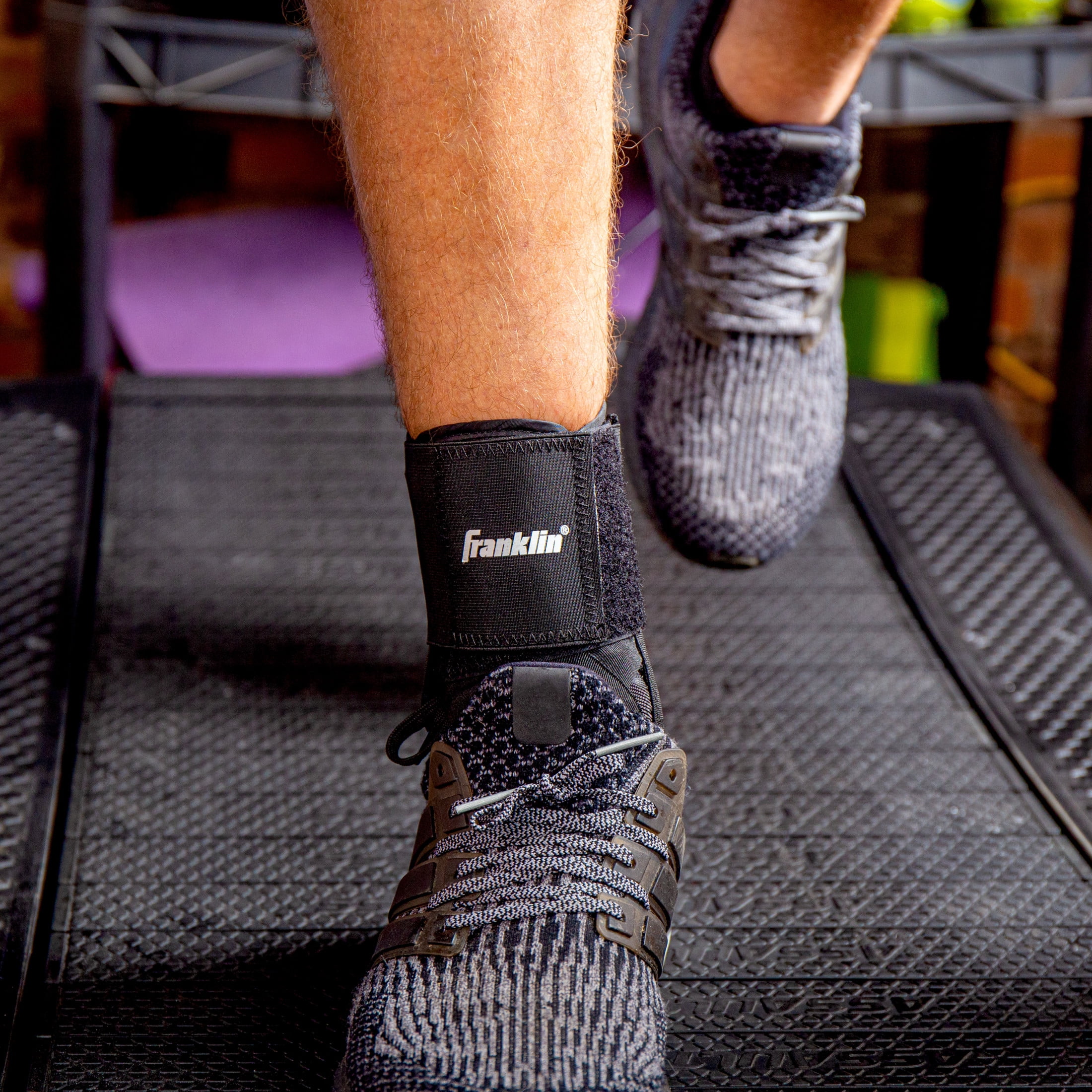 Franklin Sports Ankle Brace - Adjustable Ankle Support Stabilizer - Compression Support for Ankle Sprains and Pain - Athletic Ankle Brace - One Size