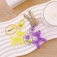 thumbnail image 3 of Wrapables Cute Balloon Dog Keychain, Bag Charm Accessory for Purse Handbag Backpack (Set of 2), Purple and Yellow, 3 of 6