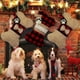 thumbnail image 1 of pstuiky Calcetín navideño para mascotas con estampado de huella de perro, bolsa de regalo a cuadros, bolsa para dulces, 1 of 9