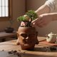 thumbnail image 1 of Maceta con forma de cabeza de Buda para plantas de interior, decoración de macetas para exteriores, contenedor tradicional para jardín, hogar, cocina Marrón, 1 of 8